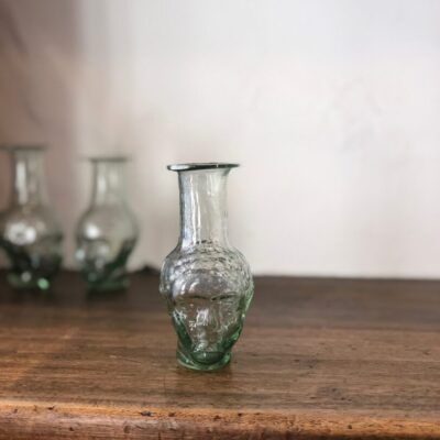 johnas-head-shaped-mini-bud-vase-transparent-hand-blown-recycled-glass